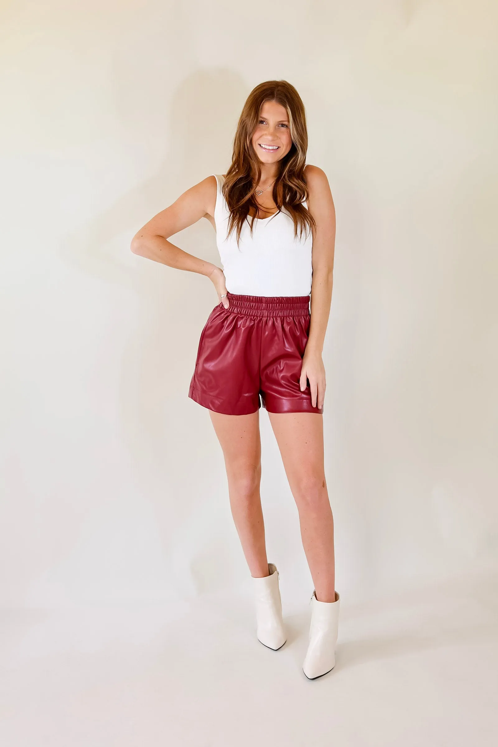 Making a Statement Faux Leather Shorts in Garnet Red