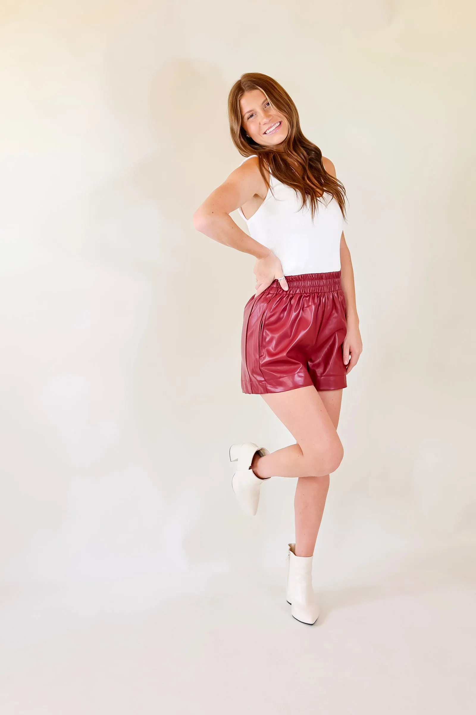 Making a Statement Faux Leather Shorts in Garnet Red